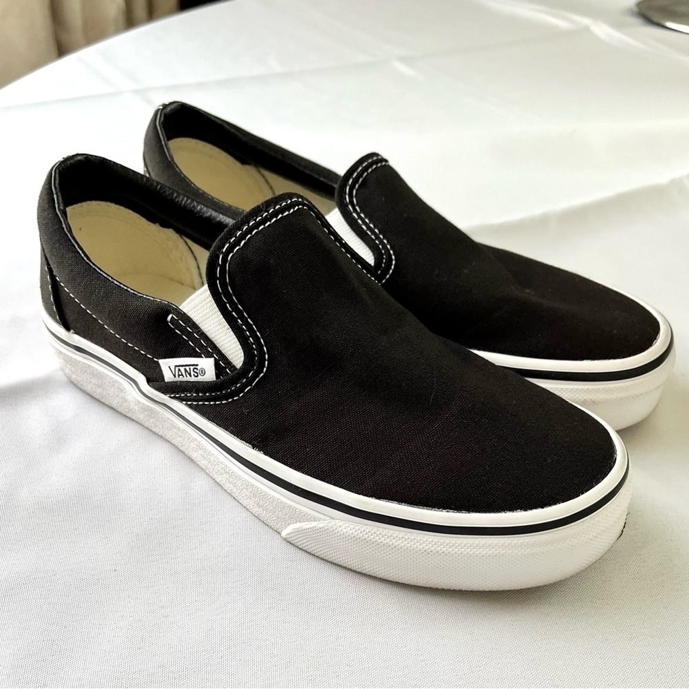 Women’s black slip-on Vans.  **EVERYTHING MUST GO, MOVING SALE**